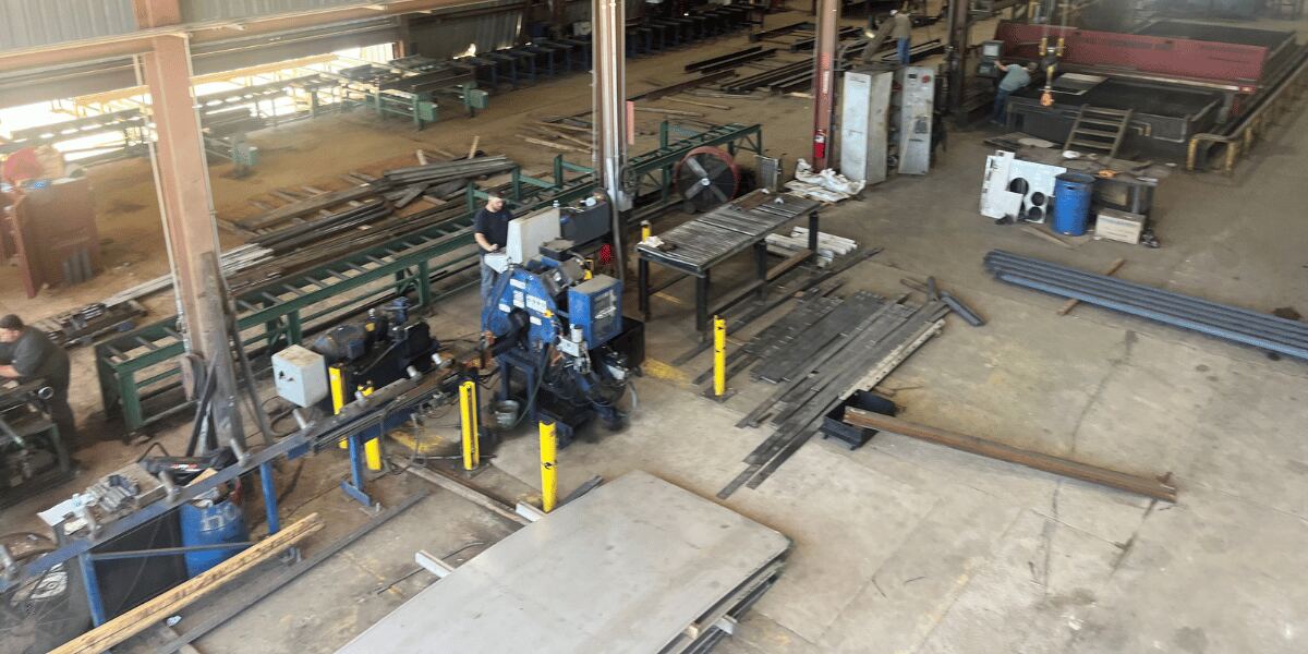 Burkes fabrication shop welders at work